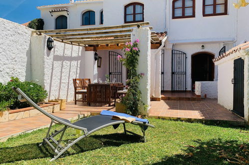 Photo 1 - Maison de 2 chambres à Nerja avec piscine et vues à la mer