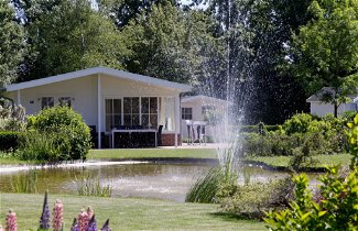 Photo 1 - Maison de 2 chambres à Noord-Scharwoude avec piscine et jardin
