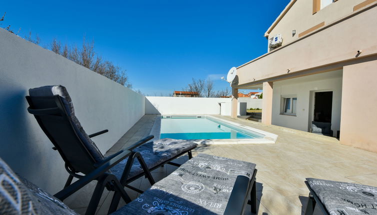 Photo 1 - Maison de 4 chambres à Jasenice avec piscine privée et vues à la mer