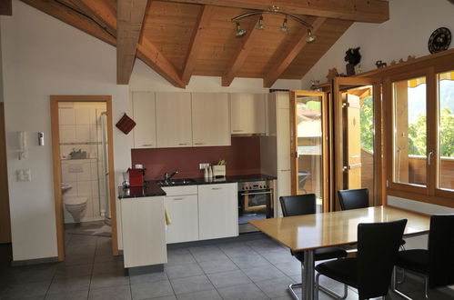 Foto 10 - Apartamento de 2 quartos em Adelboden com jardim