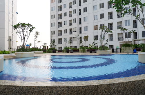 Foto 15 - Comfortable Fully Furnished 2BR Bassura City Apartment