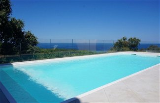 Photo 1 - Maison de 4 chambres à Sari-Solenzara avec piscine privée et vues à la mer