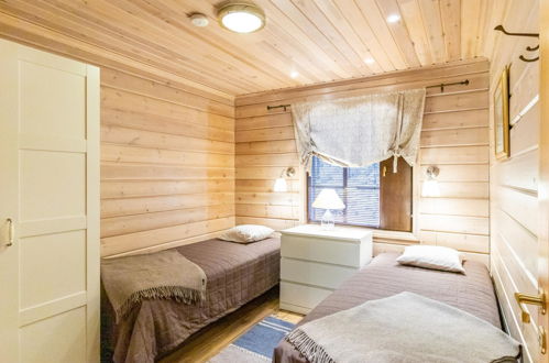Foto 16 - Casa de 2 habitaciones en Pelkosenniemi con sauna y vistas a la montaña