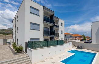 Foto 1 - Apartamento de 2 quartos em Seget com piscina e vistas do mar