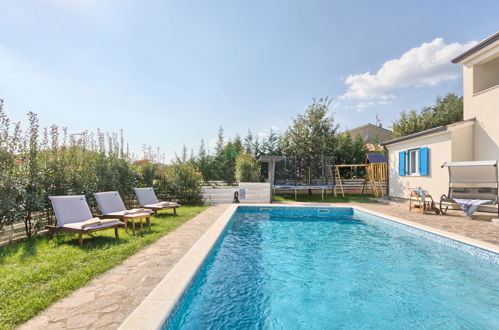 Foto 38 - Casa con 5 camere da letto a Žminj con piscina privata e vista mare