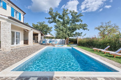 Photo 7 - Maison de 5 chambres à Žminj avec piscine privée et vues à la mer