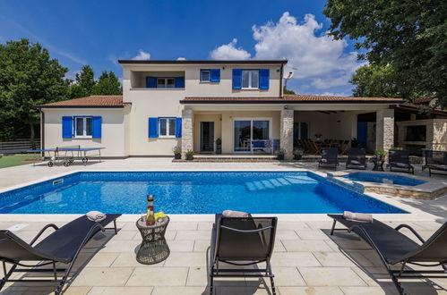 Photo 1 - Maison de 5 chambres à Žminj avec piscine privée et jardin