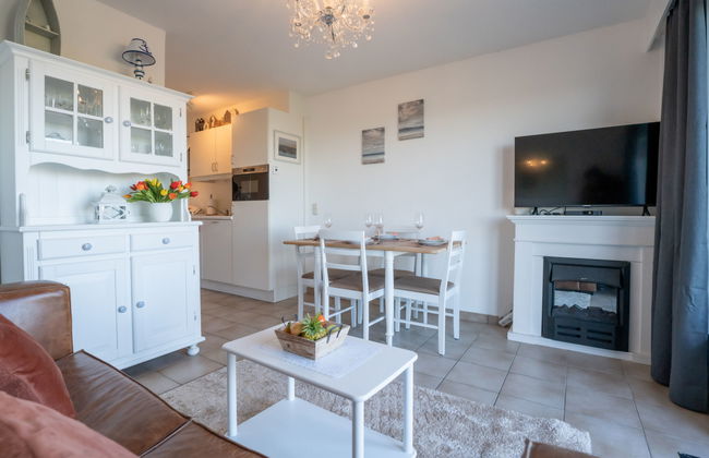 Apartamento de 2 quartos em De Haan com piscina e jardim - Foto 1