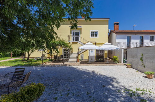 Foto 1 - Apartamento de 1 habitación en Poreč con jardín y vistas al mar