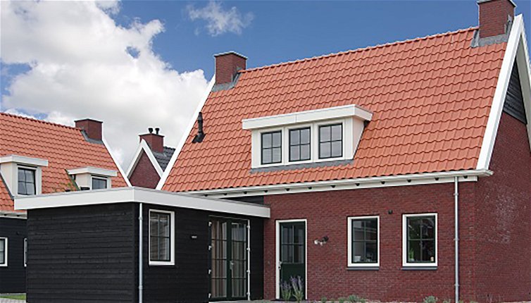 Photo 1 - Maison de 3 chambres à Colijnsplaat avec terrasse et bain à remous