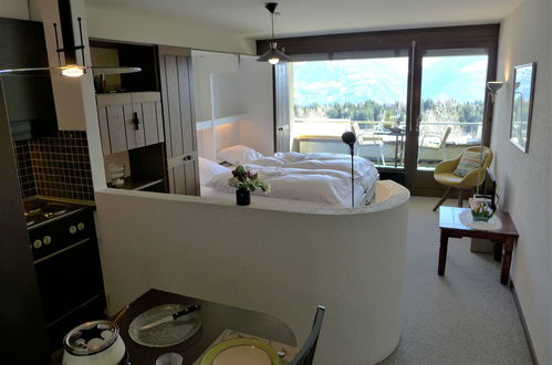 Foto 11 - Apartamento en Crans-Montana con piscina y terraza