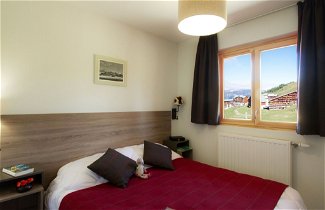 Foto 1 - Appartamento con 2 camere da letto a La Plagne Tarentaise con piscina e vista sulle montagne
