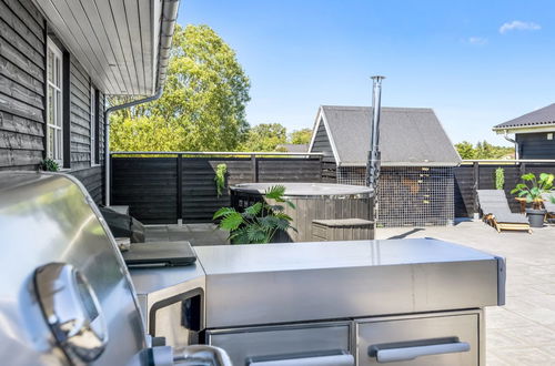 Foto 12 - Casa de 3 quartos em Sæby com terraço e banheira de hidromassagem