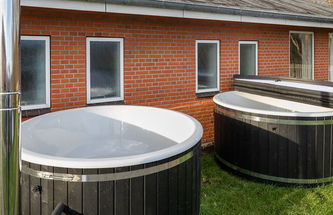 Casa de 14 quartos em Tim com terraço e banheira de hidromassagem - Foto 27