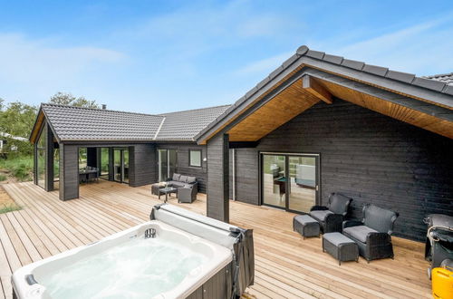 Foto 37 - Casa de 3 quartos em Ringkøbing com terraço e banheira de hidromassagem