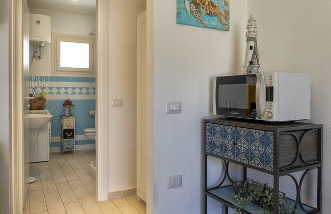 Apartamento de 2 quartos em Badesi com piscina e jardim - Foto 10