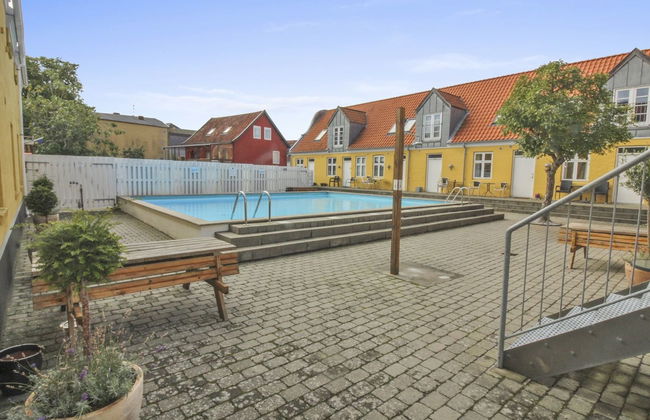 Apartamento de 1 quarto em Gudhjem com piscina e terraço - Foto 16