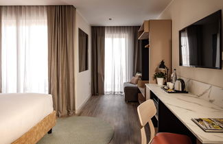 Foto 3 - Strand Suites