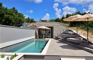 Foto 2 - Casa de 3 habitaciones en Lovrec con piscina privada y terraza
