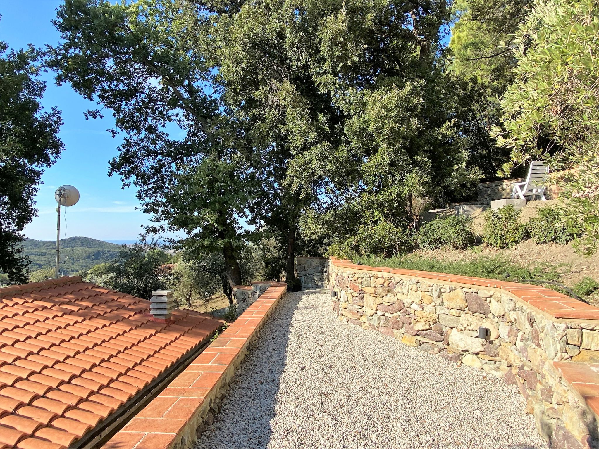 Photo 36 - Maison de 1 chambre à Castellina Marittima avec jardin et vues à la mer