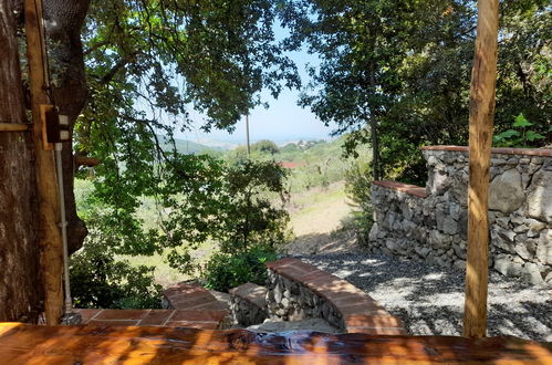 Photo 32 - Maison de 1 chambre à Castellina Marittima avec jardin et vues à la mer