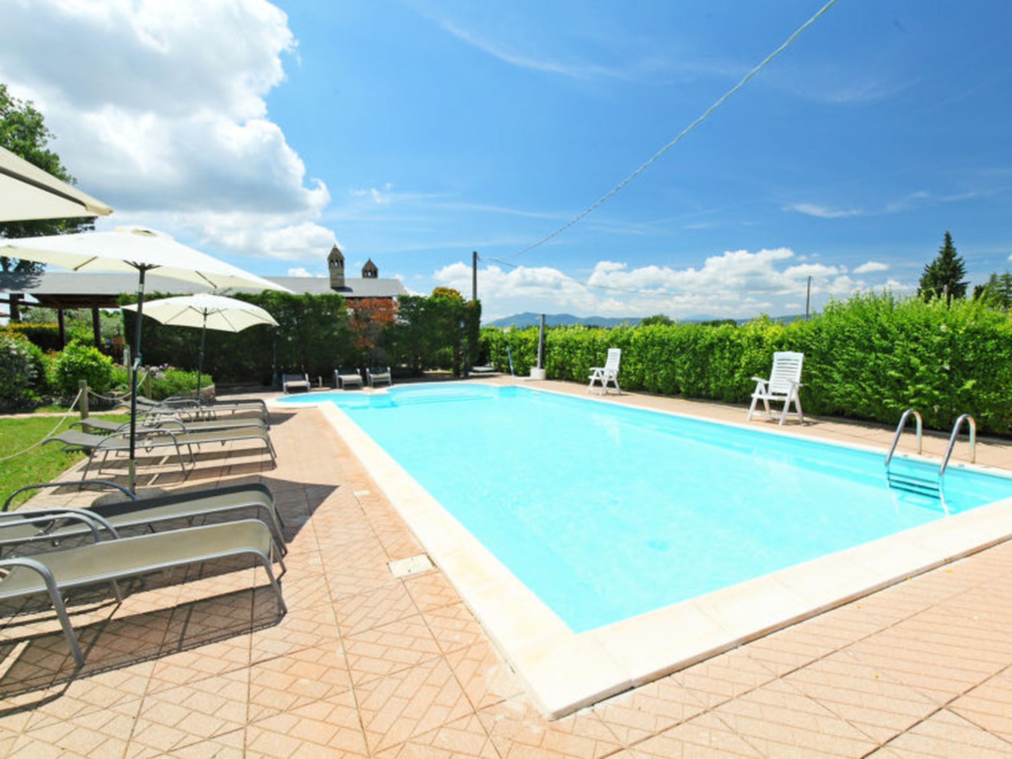 Photo 2 - Maison de 1 chambre à Castiglione del Lago avec piscine et vues sur la montagne