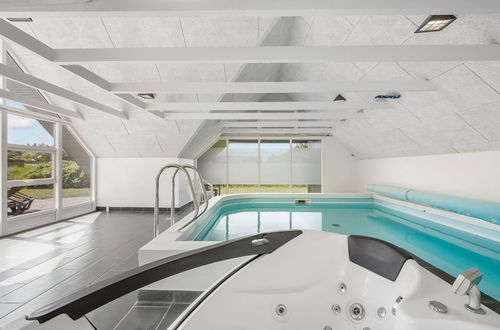 Foto 20 - Haus mit 4 Schlafzimmern in Ringkøbing mit privater pool und terrasse