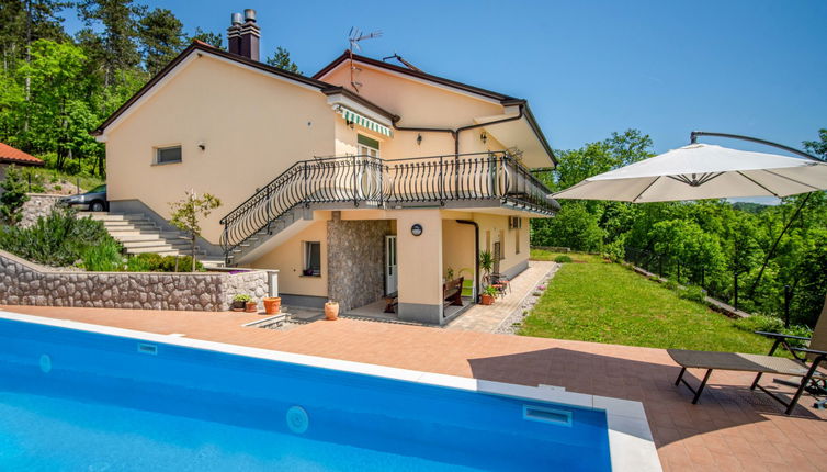 Photo 1 - Maison de 2 chambres à Klana avec piscine privée et vues à la mer