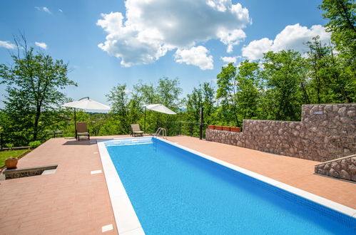 Photo 14 - Maison de 2 chambres à Klana avec piscine privée et jardin