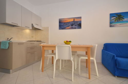 Foto 6 - Apartamento de 1 habitación en Lignano Sabbiadoro con piscina y jardín