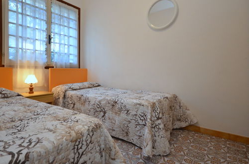 Foto 9 - Casa con 3 camere da letto a Lignano Sabbiadoro con giardino e terrazza