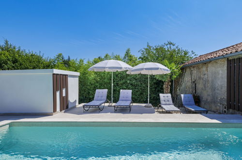 Photo 5 - Maison de 2 chambres à Pićan avec piscine privée et jardin