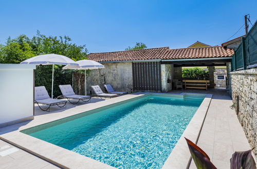 Photo 14 - Maison de 2 chambres à Pićan avec piscine privée et jardin