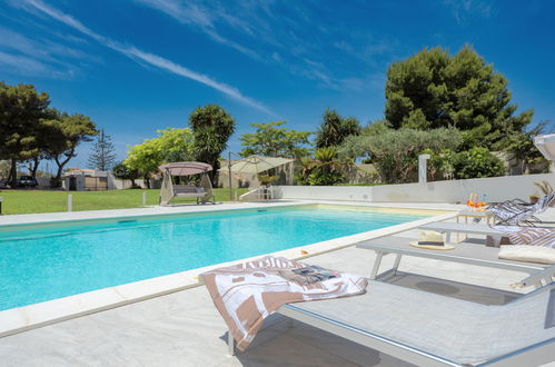 Photo 38 - Maison de 3 chambres à Marsala avec piscine privée et jardin