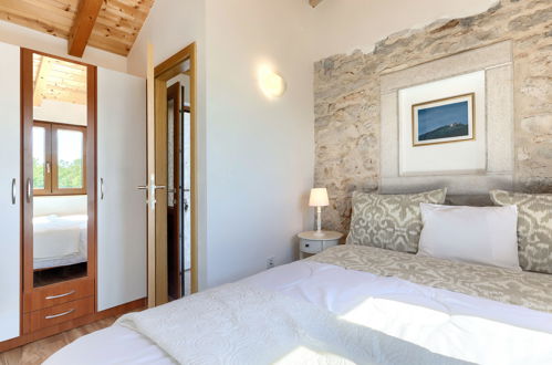 Foto 30 - Casa con 2 camere da letto a Umag con piscina privata e vista mare