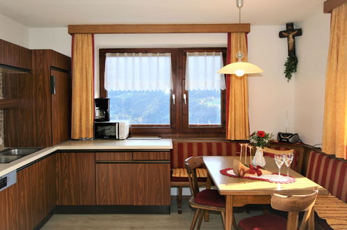 Foto 44 - Appartamento con 3 camere da letto a Aschau im Zillertal con giardino