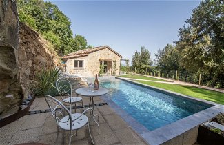 Foto 1 - Casa de 1 habitación en Passignano sul Trasimeno con piscina privada y vistas a la montaña