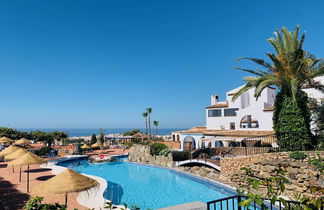 Photo 1 - Maison de 2 chambres à Nerja avec piscine et vues à la mer