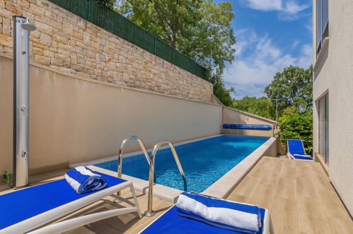 Photo 19 - Maison de 3 chambres à Croatie avec piscine privée et vues à la mer