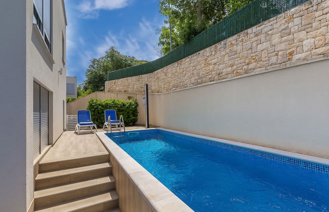 Casa de 4 quartos em Malinska-Dubašnica com piscina privada e jardim - Foto 17