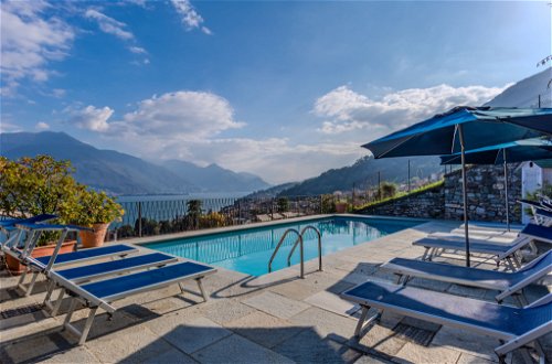 Foto 2 - Apartamento de 2 habitaciones en Musso con piscina y vistas a la montaña