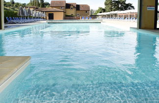 Foto 2 - Haus mit 1 Schlafzimmer in Sarlat-la-Canéda mit schwimmbad und terrasse