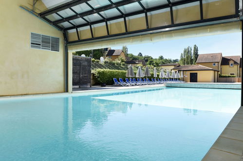 Foto 37 - Casa con 1 camera da letto a Sarlat-la-Canéda con piscina e terrazza