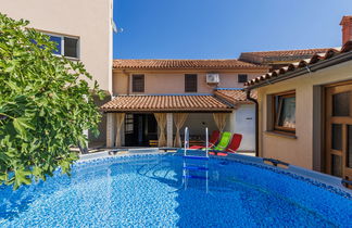 Photo 1 - Maison de 3 chambres à Marčana avec piscine privée et jardin