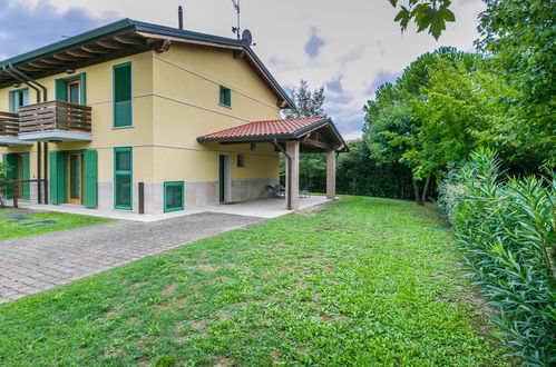 Photo 36 - Maison de 2 chambres à Lignano Sabbiadoro avec piscine et jardin