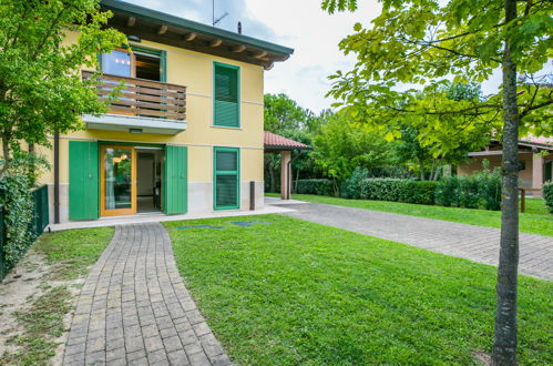 Foto 34 - Casa con 2 camere da letto a Lignano Sabbiadoro con piscina e giardino