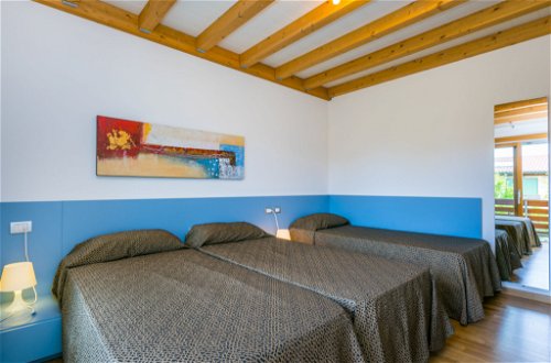 Photo 22 - Maison de 2 chambres à Lignano Sabbiadoro avec piscine et vues à la mer