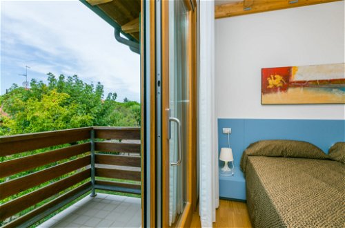 Foto 24 - Casa con 2 camere da letto a Lignano Sabbiadoro con piscina e vista mare