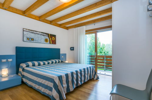 Photo 17 - Maison de 2 chambres à Lignano Sabbiadoro avec piscine et vues à la mer