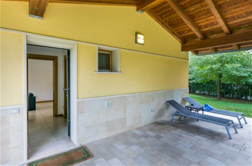 Foto 33 - Casa con 2 camere da letto a Lignano Sabbiadoro con piscina e vista mare